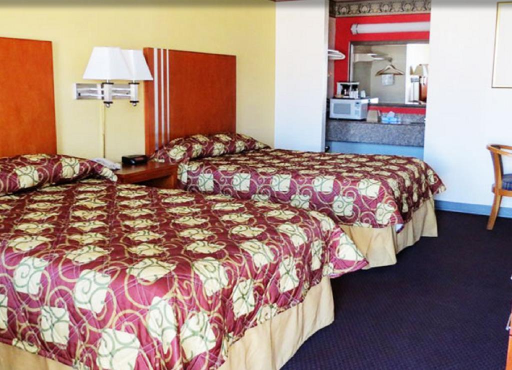 Winnie Inn And Suites Стая снимка